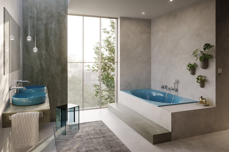 Hochwertiges Designer-Badezimmer mit der Badewanne Schmidlin ELLA OVAL und den runden Waschbecken Schmidlin MAVA aus emailliertem Stahl; moderne Betonoptik, grosse Fensterfront und elegantes Interior-Design für ein luxuriöses Badambiente.