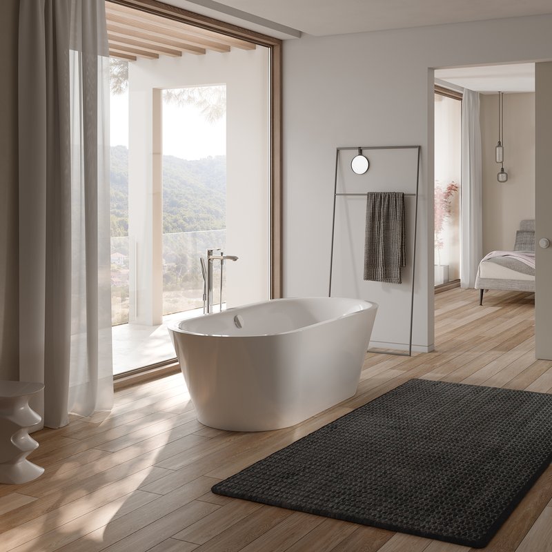 Stilvolles Badezimmer mit Schmidlin SELLA SHAPE FRONT Badewanne mit Whirlsystem, elegantem Parkettboden und hellem Tageslichtambiente.