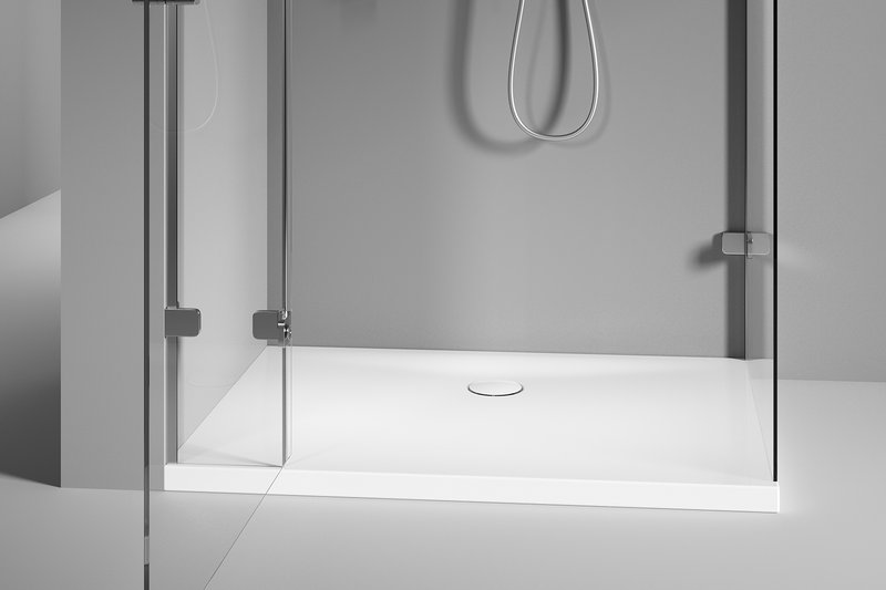 Duschfläche mit Schürze, bodennaher Ausführung und Glasabtrennung im minimalistischen Bad-Design